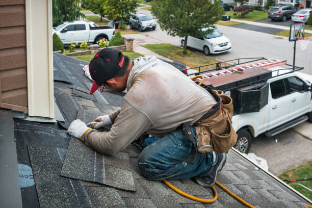 Professional Roofing technician working in Fall Creek, WI